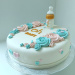 Babyflesdecoratieopgenderrevealtaart