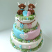 Rozeenblauwestapeltaartmetbabydecoraties